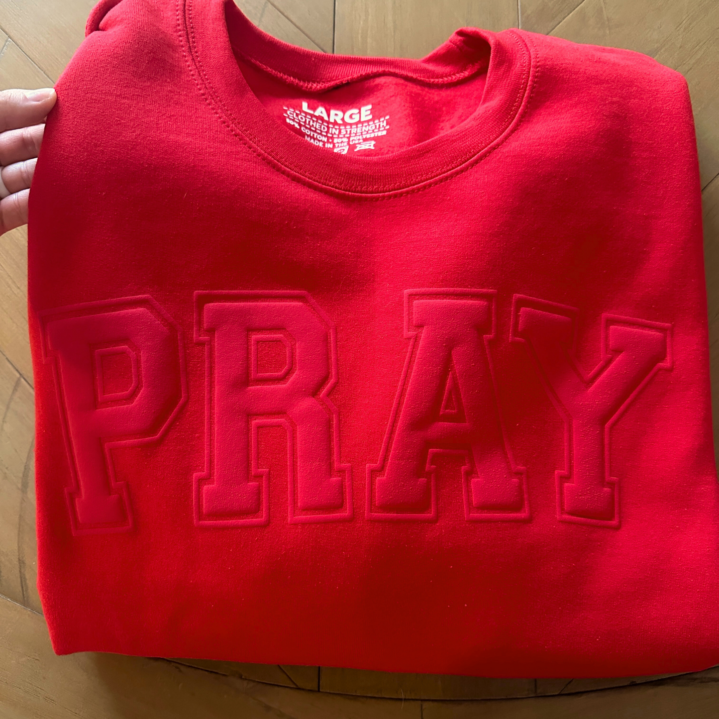 Red PRAY sweatshirt