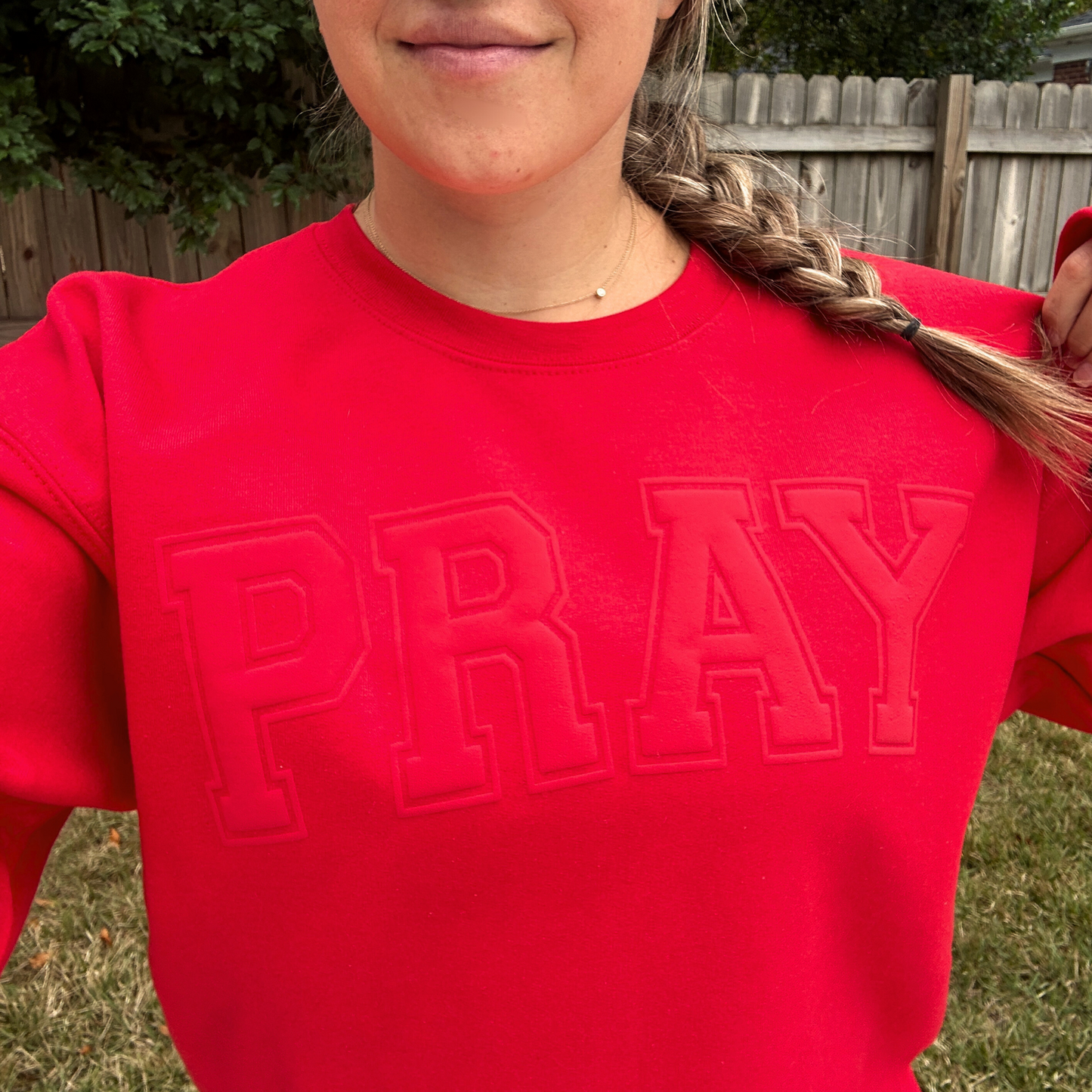 Red PRAY sweatshirt