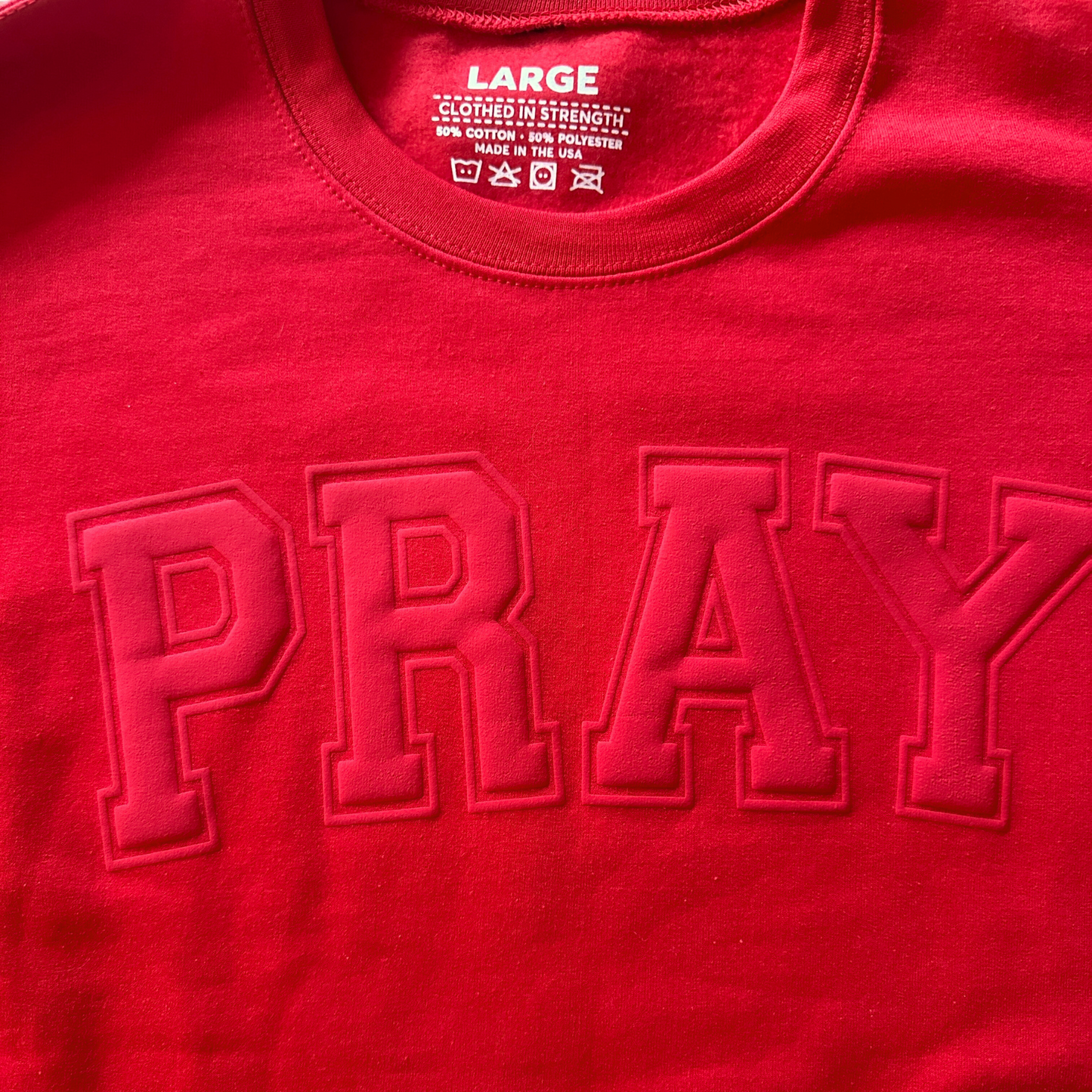 Red PRAY sweatshirt